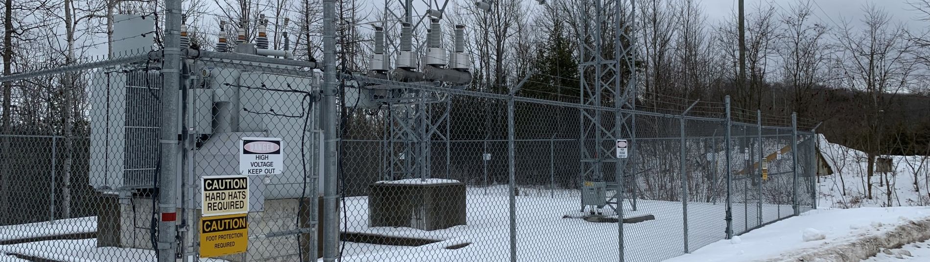 Electrical substation with warning signs